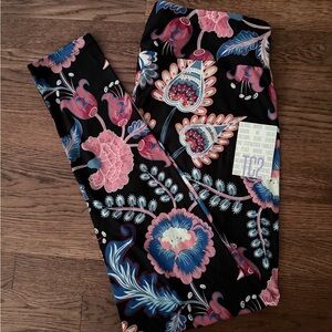 LuLaRoe  Leggings with Pink and Blue Floral Design - black background